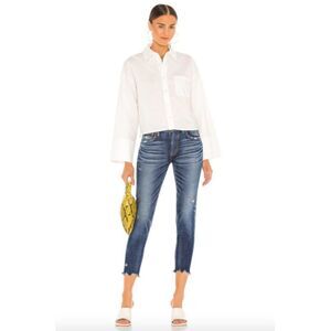 Moussy Vintage dark wash cotton denim distressed tapered cropped raw cut jeans